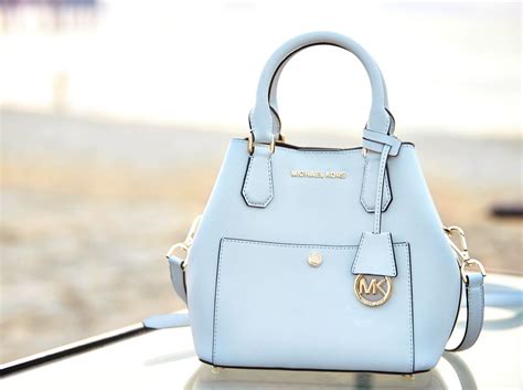 michael kors luggage color wallet|light blue designer purse.